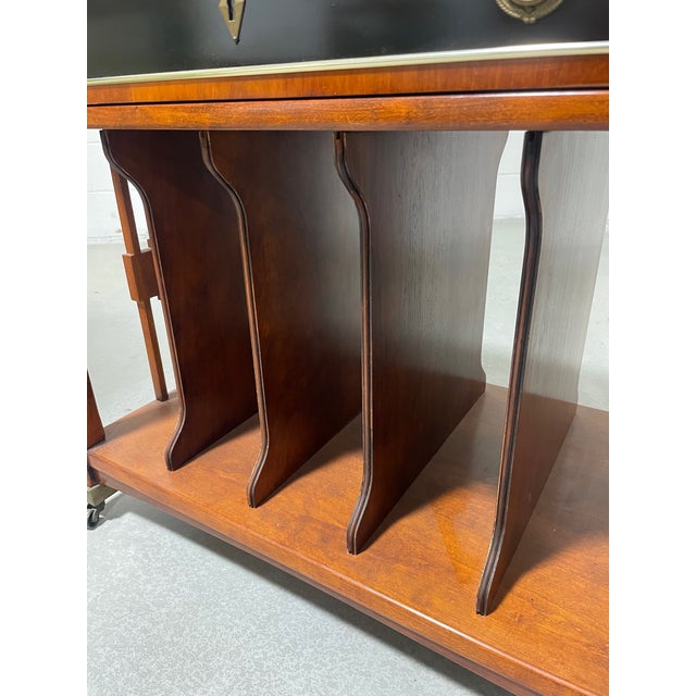 A wonderful Art Deco-style side table on casters designed for vinyl LP record album storage (or for large coffee table...