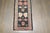 a narrow mid 20th century floral tibetan runner