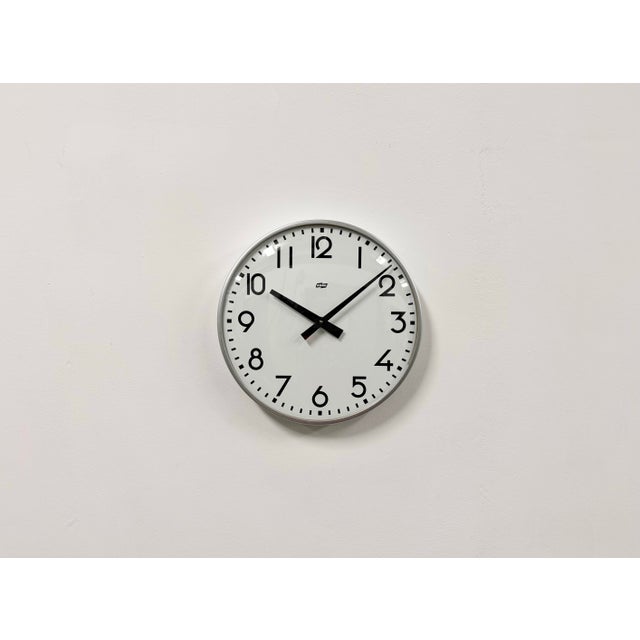 Vintage industrial wall clock produced by ESMI during the 1980s .It was originally designed for public buildings, schools,...
