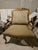 Chair name: Savanah This piece features a contoured backrest with a carved frame crest, accented by gold leaf pattern...