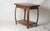 This Art Deco side table is distinguished by its timeless elegance and solid oak construction. Its geometric lines,...