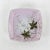 A delightful vintage square porcelain dish painted in a soft pink hue, this piece boasts a graceful fern design in earthy...