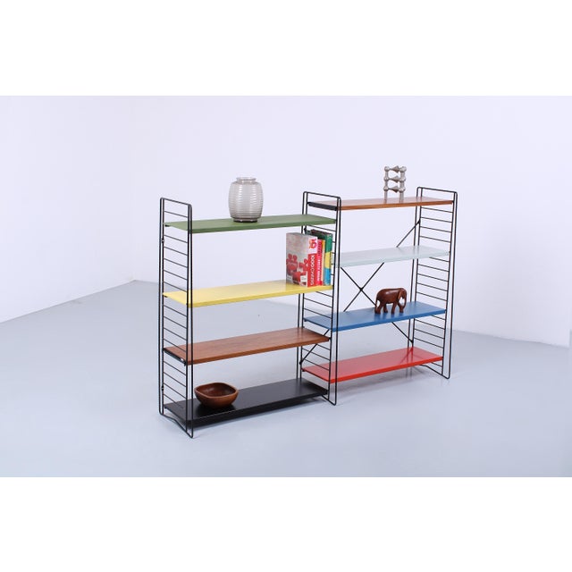 Characteristic and very decorative modular shelving unit or room divider from the Netherlands, all genuin Tomado. Heavy...