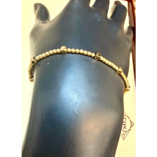 Delicate BALL Bracelet in 18 Karat Yellow gold 5.0 Gm, 7 inch long with multiple station 18 K Yellow Gold 5.0 gm Line...
