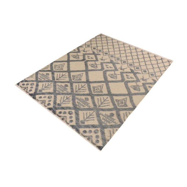 Make a statement in your home with this meticulously hand-knotted high-low pile Moroccan wool rug. An intricate design...