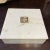 Beautiful white marble box with Mother of Pearl detail on top. Very heavy and perfect to add character to any tabletop space.