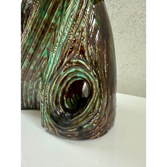 This is a perfectly preserved mid-century modern glazed ceramic table lamp in the style of a tree trunk w/ bark. Lamp to...