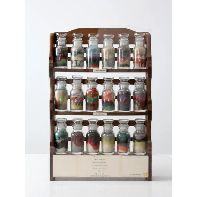 A vintage sand art collection. The collection was crafted to represent the "Earth Forms in different sections of the...