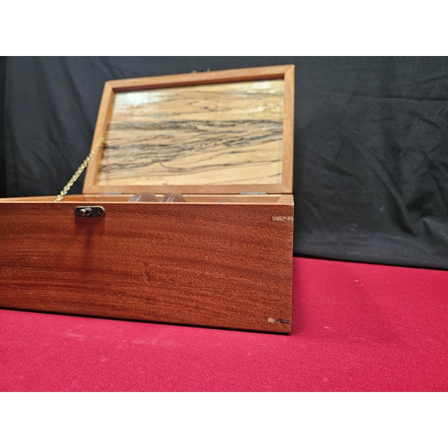 Yixing Tea Set in Wooden Presentation Box Elegant Yixing clay tea set complete with 1 teapot, 6 cups, and 6 matching...