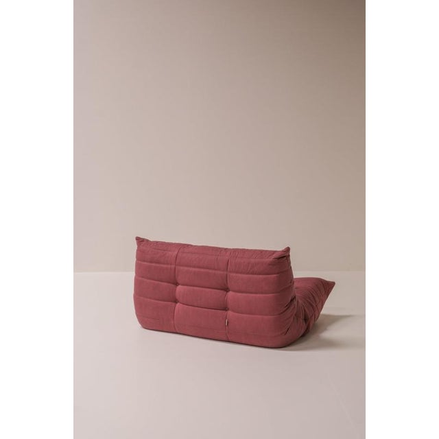Original vintage togo two-seater sofa, designed by michel ducaroy for ligne roset. Introduced in 1973, the togo is...