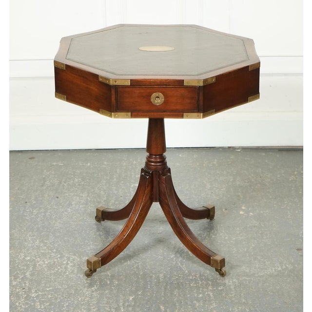 The Revolving Military Campaign Regency Style Drum Side End Table by Bevan Funnell It is a unique and elegant piece of...