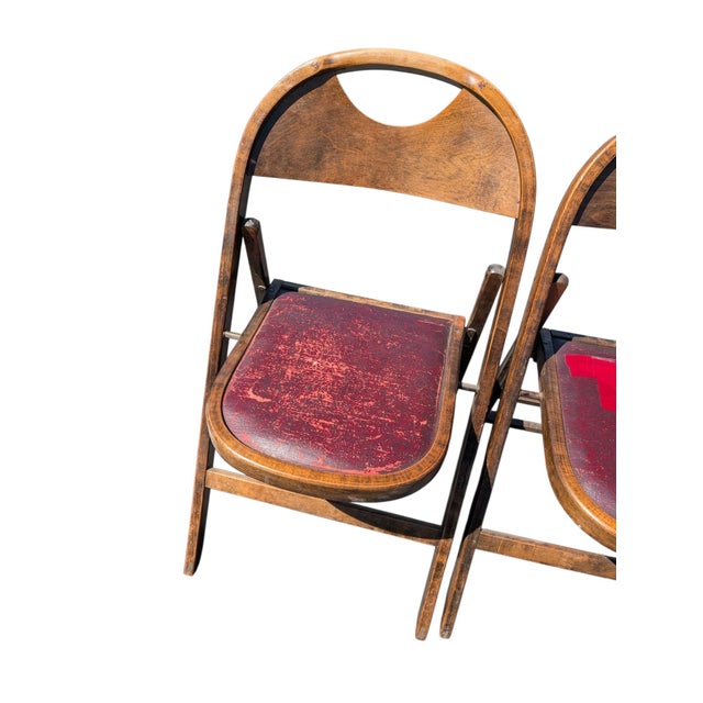 A handsome and increasingly hard-to-find group of eight vintage folding chairs by ACME Chair Company, including six...