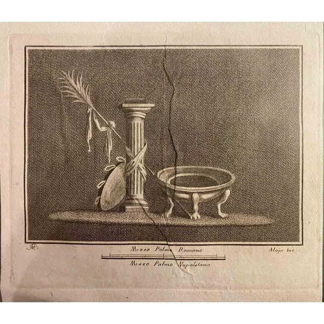 Still Life Fresco from "Antiquities of Herculaneum" is an etching on paper realized by Luigi Aloja in the 18th Century....