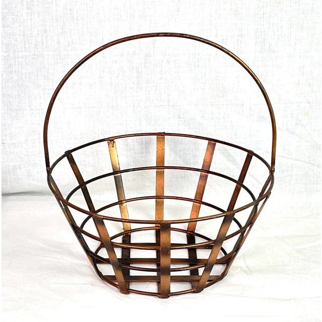 Distressed Bronze Copper Style Metal Basket Dimensions: 9.5”w x 9.5”d x 10.25”h