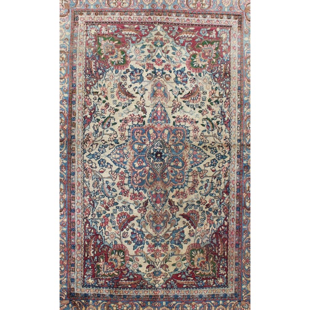Ornately detailed antique Lavar Kerman rug with floral Design, rug , / Lavar Kerman, circa 1910. This large, antique...