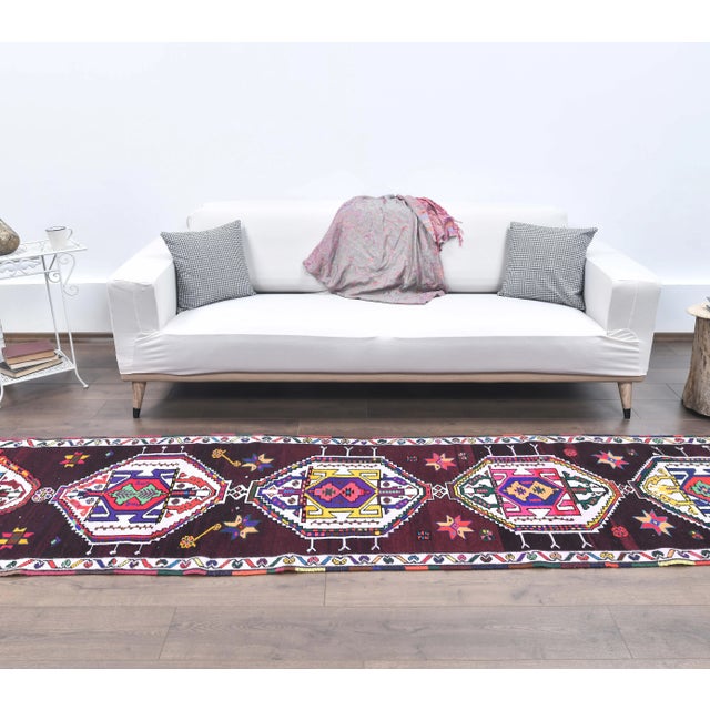 Vintage Turkish Hand-Knotted Herki Runner Rug is a semi-Vintage rug. '60s Eastern region of Turkey's unique rug is...