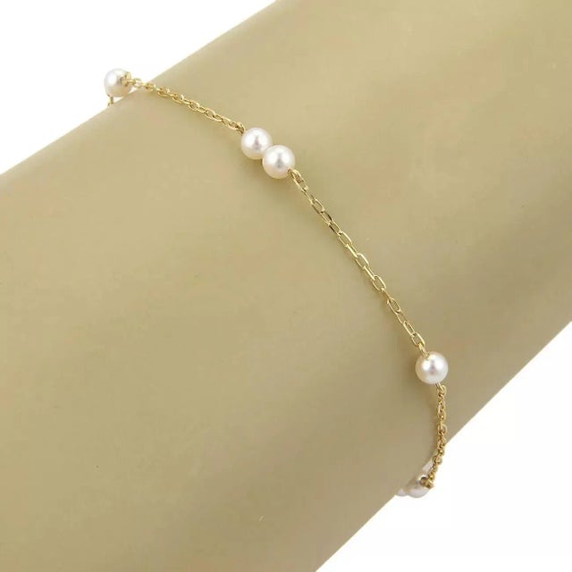 Pure perfection from Mikimoto, this beautiful and elegant bracelet is crafted from solid 18k yellow gold with a fine...