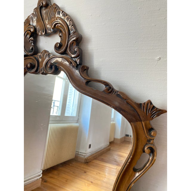Superb wooden mirror in excellent condition. French work, circa 1960. Rocaille style. Dimensions: 80cm x 135cm x 5cm. Can...