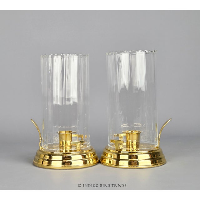Pair of Vintage Brass Candlestick Holders with Glass Hurricane Shades These beautiful candle holders are made from solid...