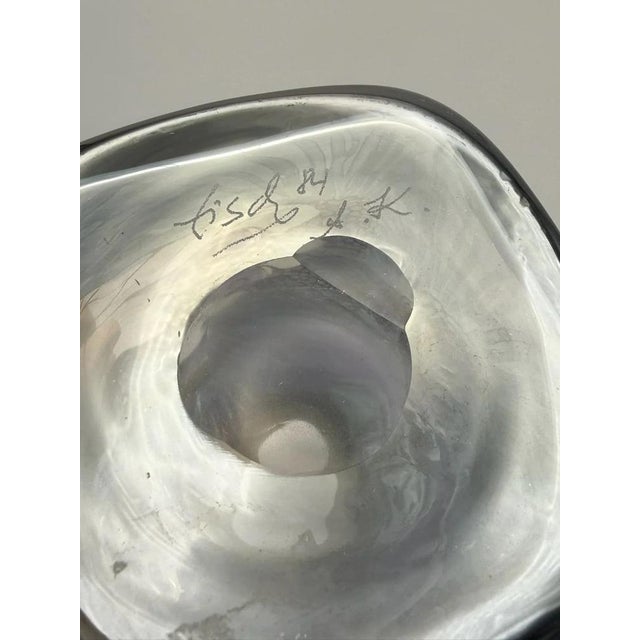 This elegant studio glass vase from the renowned Eisch glassworks is an outstanding example of German glass art from the...