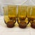 These are vintage Libbey Connoisseur amber tulip-style glassware tumblers featuring a distinct flared base and rich brown...