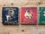 A charming set of four vintage Italian advertising ceramic coasters featuring colorful early 20th-century promotional...