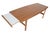 This modern mid century coffee table in walnut was Attributed to Johannes Andersen for Trensom in the 1960s. Expertly...