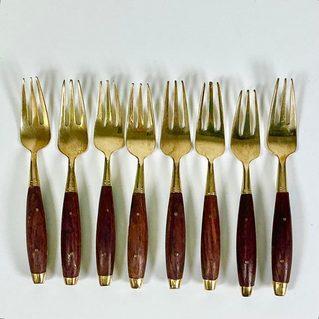 This is a lovely set of Brass and Rosewood Appetizer or Dessert Forks. They are wonderful accent flatware when you are...