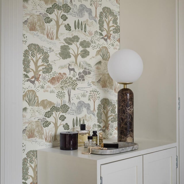Featuring a fanciful forest scene inspired by Roman mythology, Boråstapeter’s Diana wallpaper is a serene flora-and-fauna...