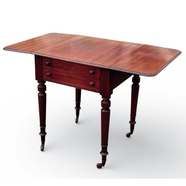 Mahogany Pembroke Drop Leaf Side Table, Lamp Table, Brass Castors. Has drawers one side, and dummy drawers the other, so...