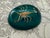 Midcentury paperweight with a taxidermy scorpion specimen encased in lucite. Oval in form with a dark teal background....