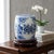 This elegant two-piece set features a classic Chinese Blue and White Porcelain Garden Stool (or Drum Stool) paired with a...