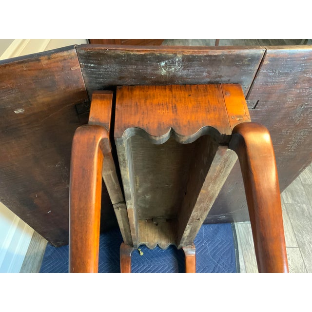 A very attractive early Federal Queen Anne Curly Maple Drop leaf table with a great aged color and patina on an older...