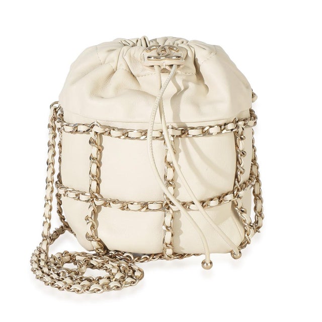 Item #: 154957 Interior Material: Fabric Size: Mini Features Interior: One card slot Dimensions: 4.5 x 7 x 4.5 in Handbag...