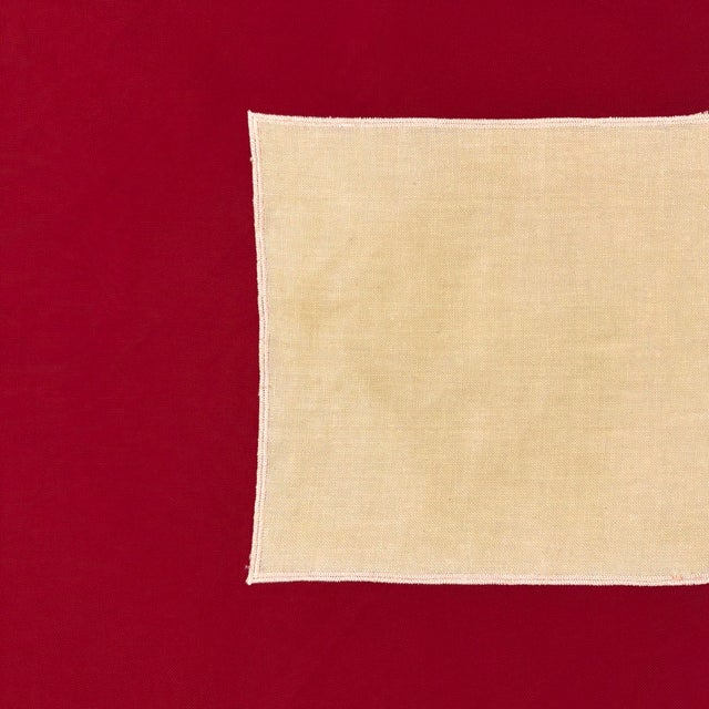 This vintage Swiss flag is made from a cotton cloth, with fully sewn cross slightly askew and visible on both sides....