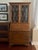 The Ethan Allen Heirloom Collection Secretary Desk, Top, and Chair is a unique and elegant piece of furniture that exudes...