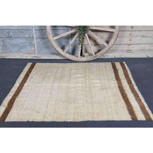 Vintage Turkish Hand-Knotted vintage rug is a semi-antique vintage kilim area rug.'70s Eastern region of Turkey's unique...