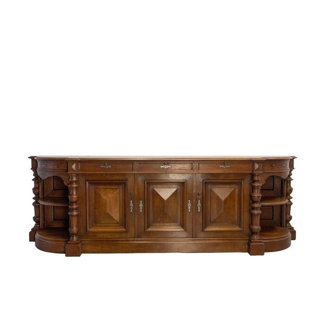 French large massive oak credenza or enfilade. Made circa 1900, this sideboard is very large but it does not seems massive...