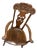 Late 19th Century German Carved Wooden Rocking Chair Featuring a "Man Blowing the Wind" Motif. For Sale