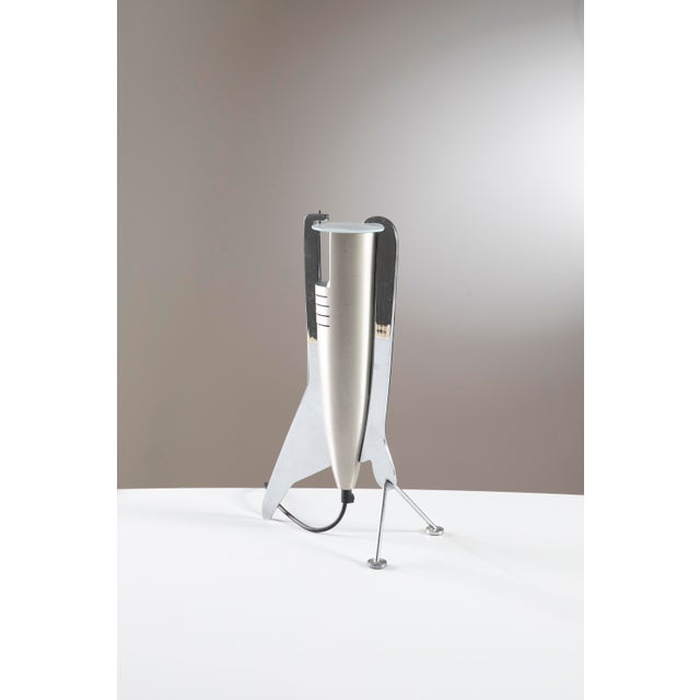 A rare and iconic "Faro" table lamp, designed by the visionary Massimo Iosa Ghini for the 1988 Memphis Milano collection....
