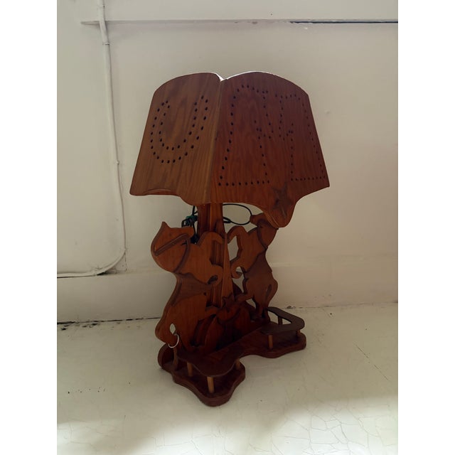 1950s/60s era western style lamp. Hand made from cut pieces of tiger oak with an integrated oak shade that has been hand...