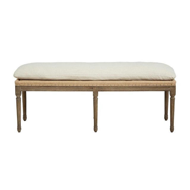 The Milton Bench epitomizes understated elegance with its solid wood frame and lightly upholstered top, complete with a...