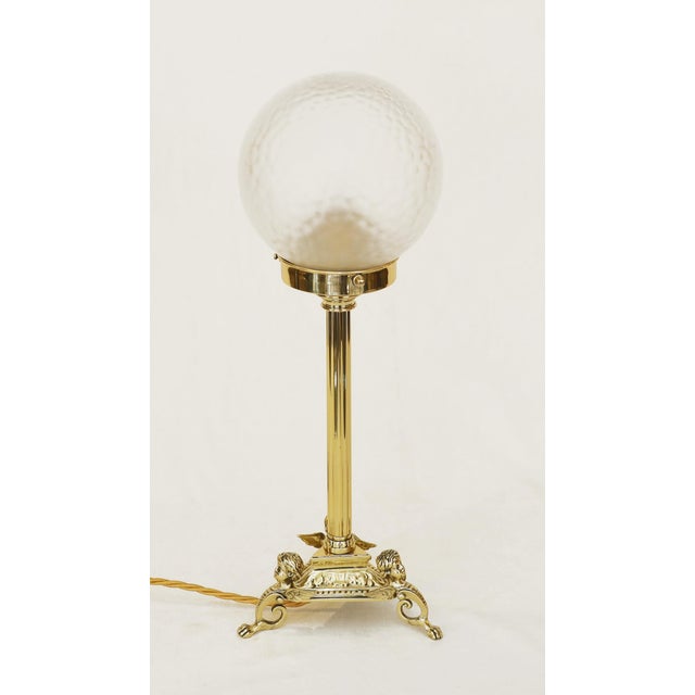 Art Nouveau Floor Lamp Art Nouveau floor lamp made circa 1905. Three angels – chased brass casting. Chased column....