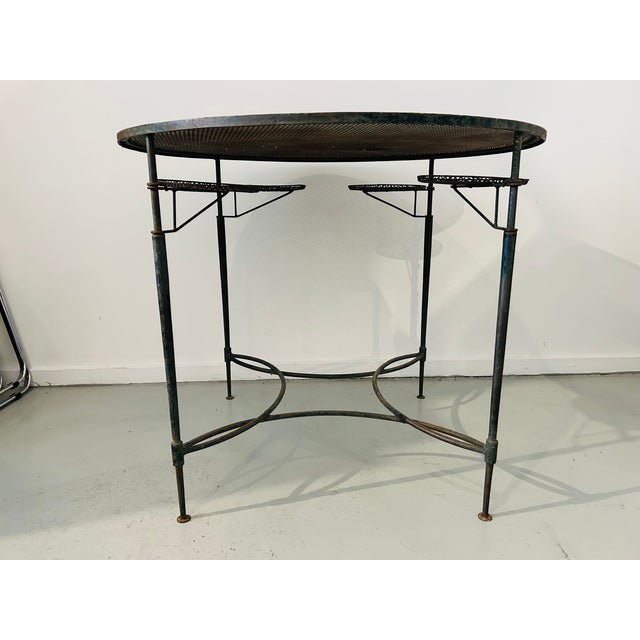 Elegant and very rare iron patio and garden dining table, breakfast table, or games table designed in Italy by Mario...