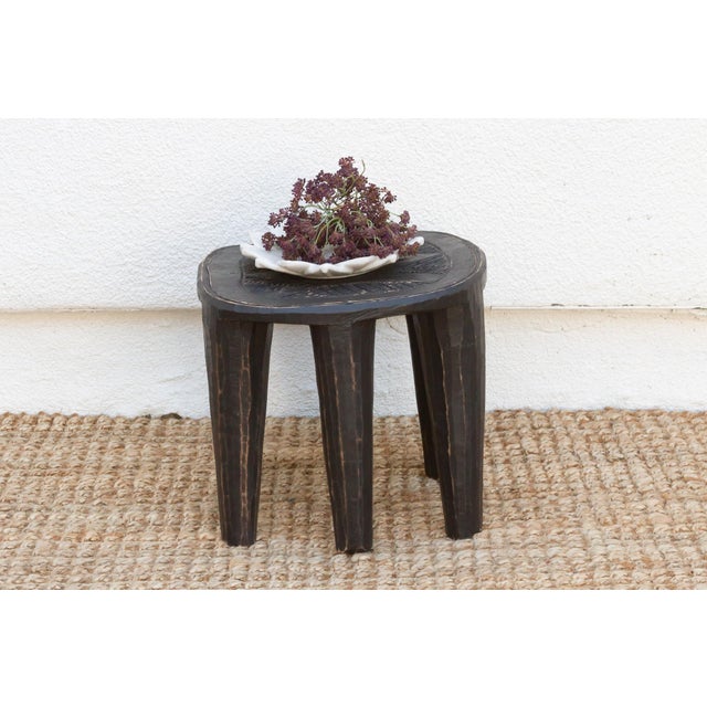 A unique piece of African art, this vintage Nupe table from Nigeria is a must-have for collectors and enthusiasts of Nupe...