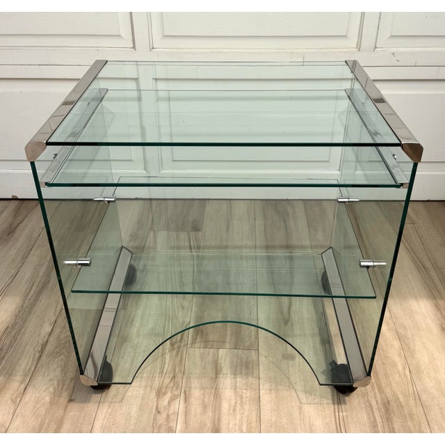 Here is a vintage Gallotti & Radice glass serving trolley, designed by Pierangelo Gallotti in 1975. Sharing the same...