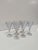 A striking matched set of six vintage Venetian Murano hand-blown wine goblets featuring luminous ice-blue conical bowls,...