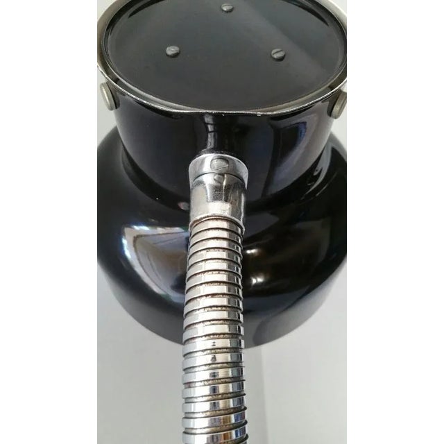 Lamp designed by Anders Pehrson in the 60s in a very unusual desktop model with flexible orientable head. In chromed and...