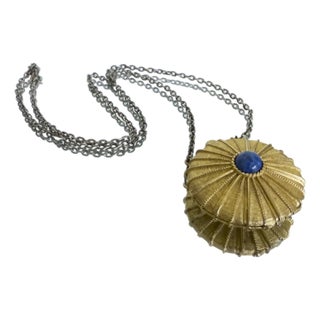 1970s Hollywood Regency Estée Lauder Empire Solid Perfume Pendant Necklace For Sale