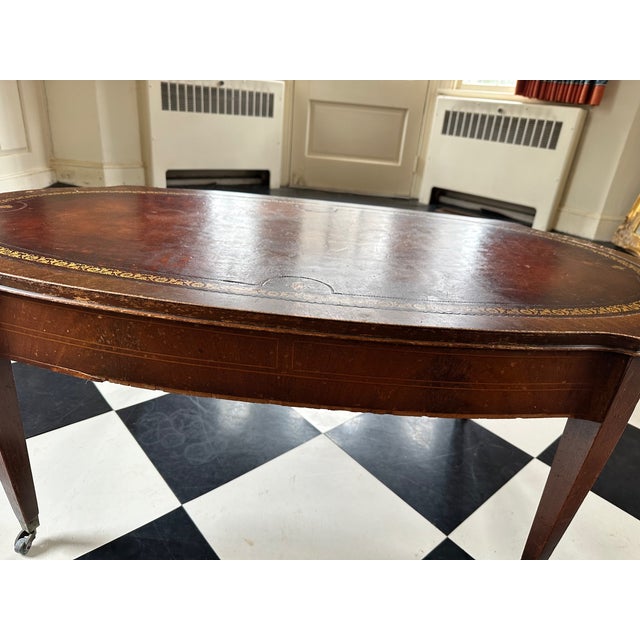 Brown Antique Oval Coffee Table With Gold Tooling For Sale - Image 8 of 12